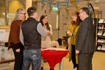 Incluza Palooza staff participants in conversation