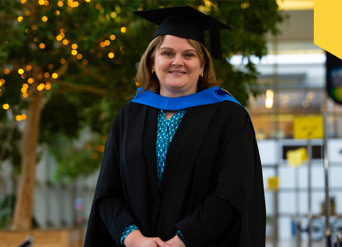 Bernadette Brady in the conservatory of O Reilly Hall on the day of her conferring ceremony