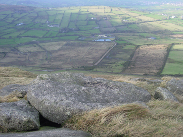 Unfinished millstone, the Mourne Mountains, Co. Down. Facing West