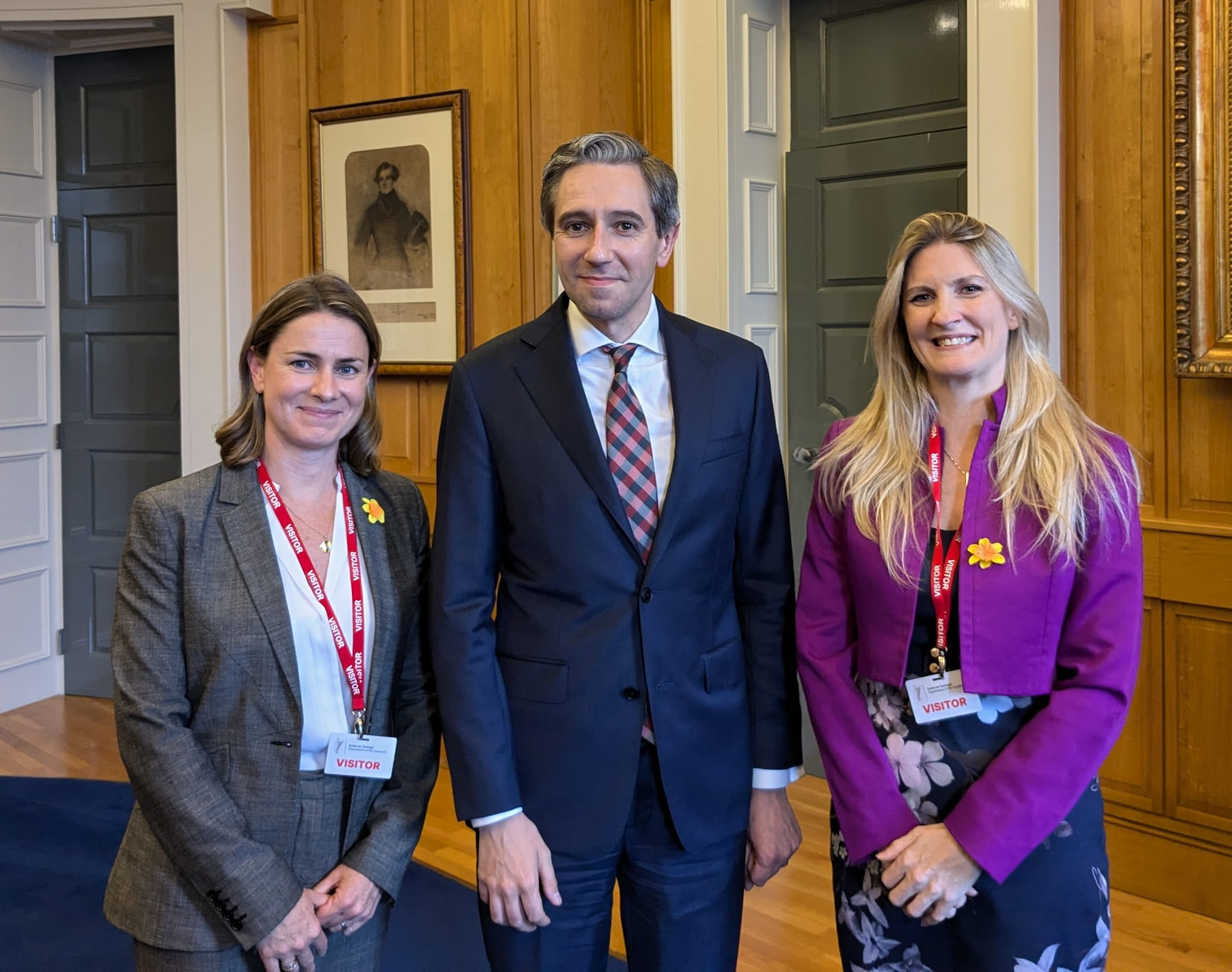 A photograph of Professor Michaela Higgins, An Taoiseach Simon Harris, and CEO of the Irish Cancer Society Averil Power