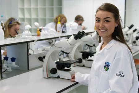 A researcher studying at a lab.