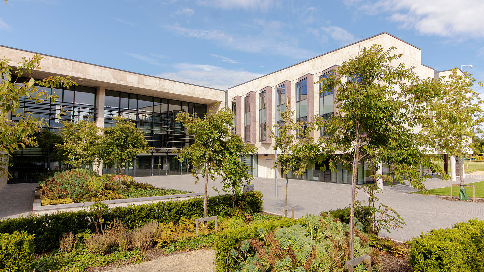 A photo of a modern building on a sunny day.