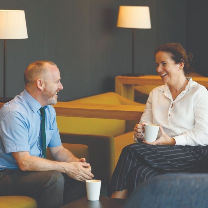 Two people having a meeting