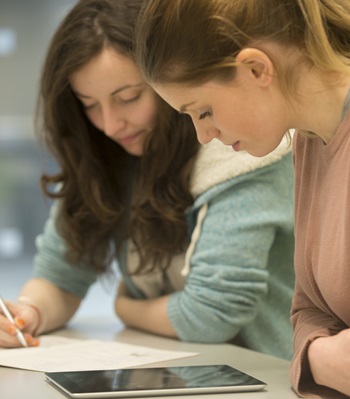 Two people studying