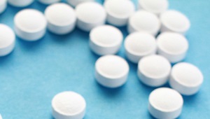 Pills on blue background