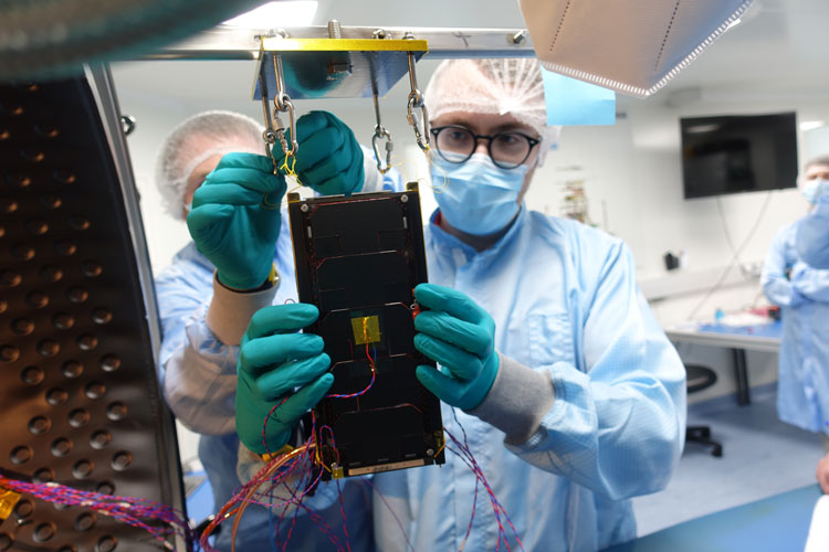 Researcher and EIRSAT-1 team member Dr. David Murphy working on the Cube Sat Engineering Qualification Model (EQM), at ESA Education Centre in Belgium.