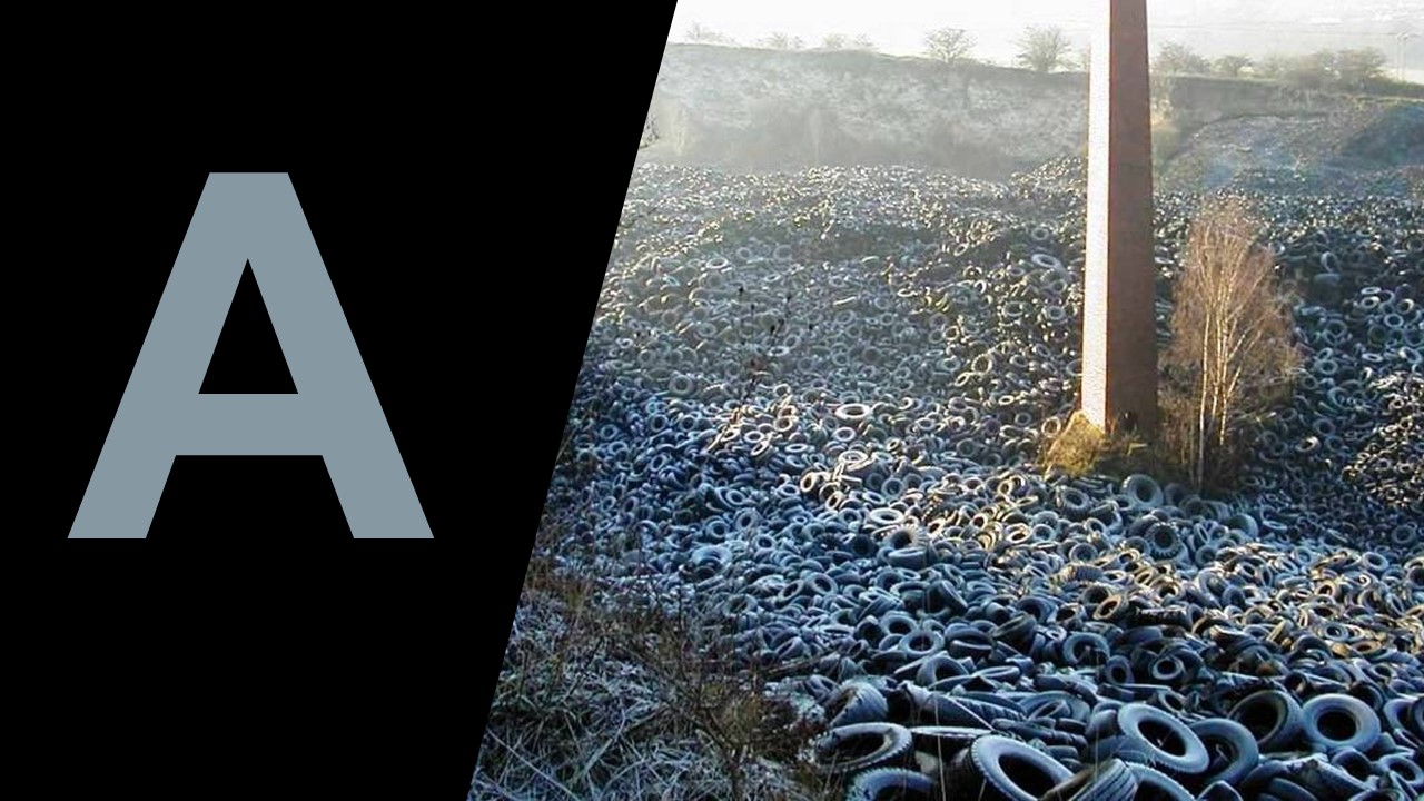 Tyres in a large landfill, large letter A