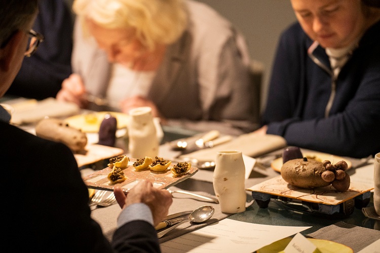 People eating the Feast