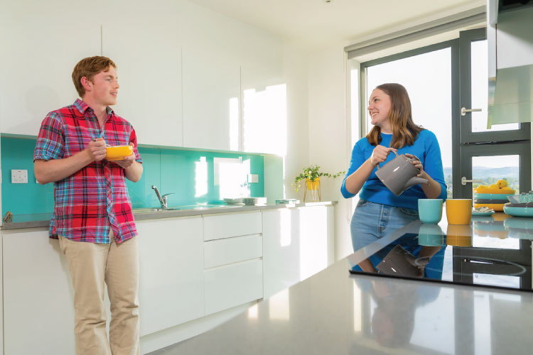 International students in the kitchen of the new UCD student accommodation