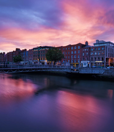 Pink sunset over the Liffey river in Dublin city.