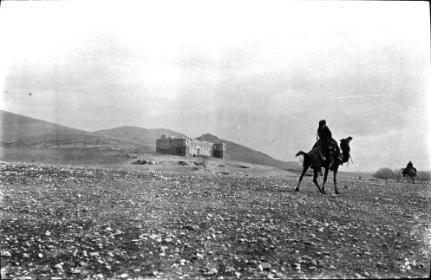 Man on a camel in landscape