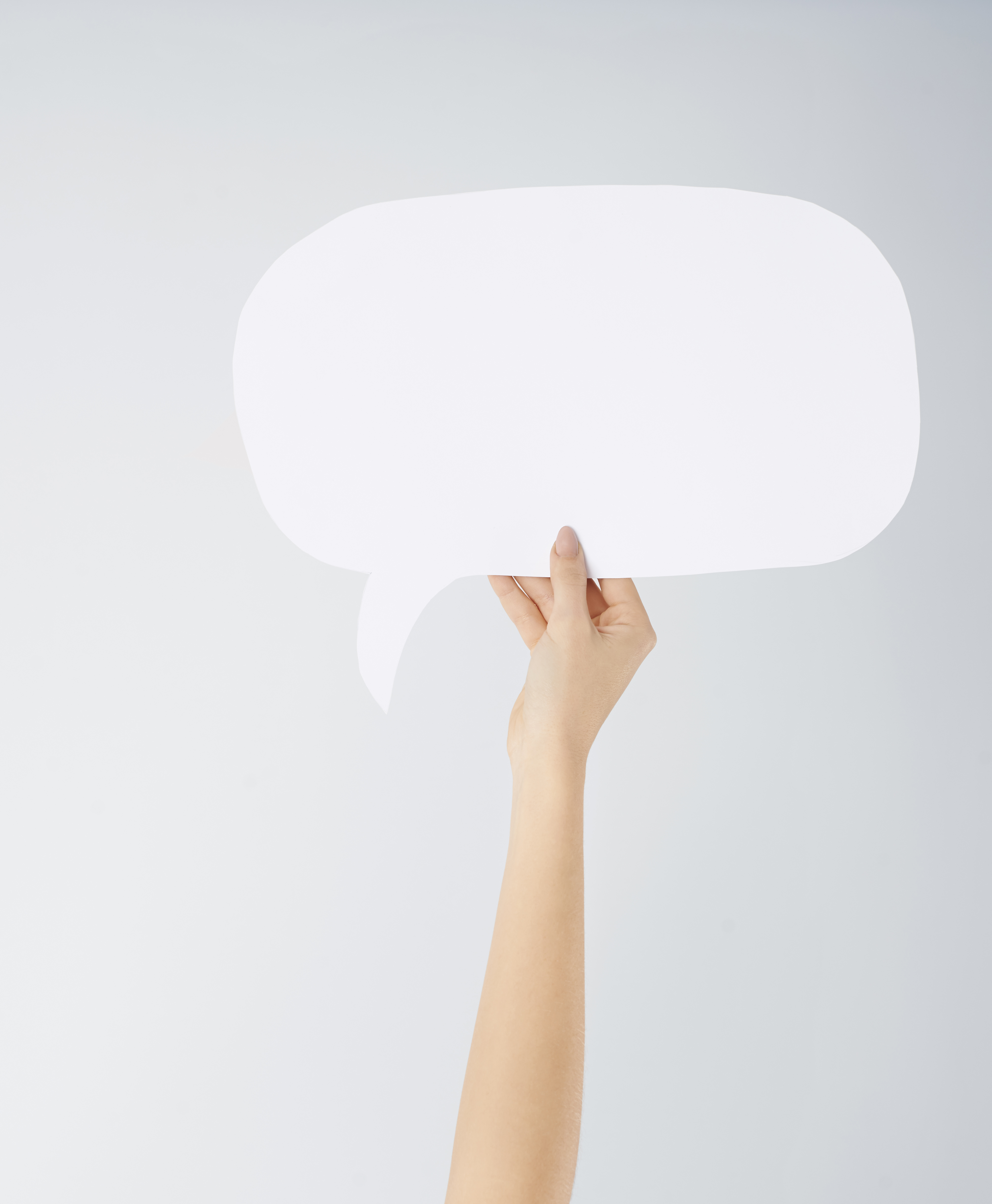 close-up-woman-s-hand-with-speech-bubble