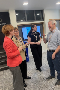 SVUH staff at coffee morning standing