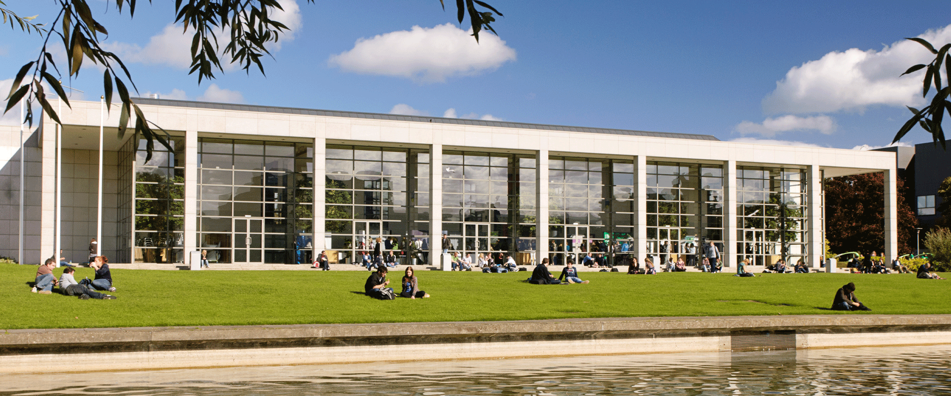 O'Reill Hall with students on lawn.