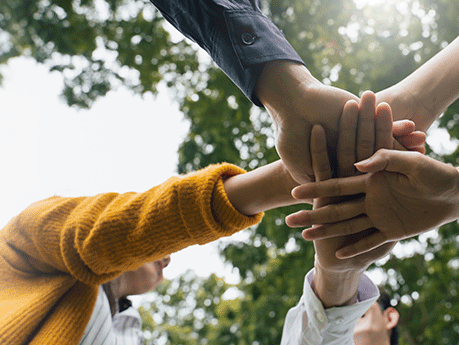 ESG,empathy,partnership and Social connection.Business people join hands together for CSR,corporate social responsibility.World environment day.Global community teamwork.Charity,volunteer, partnership