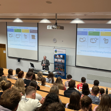 UCD librarian speaking to students at orientation