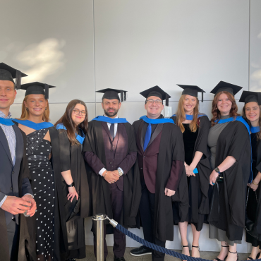 UCD graduates in caps and gowns December 2025