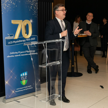 Man wearing a suit speaking at the UCD Physiotherapy 70th anniversary celebration