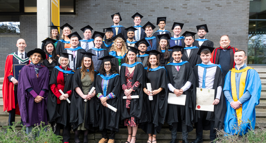 Group of smiling graduates