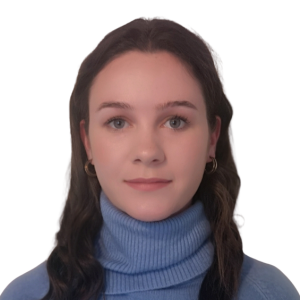 Woman with dark hair and blue jumper facing camera