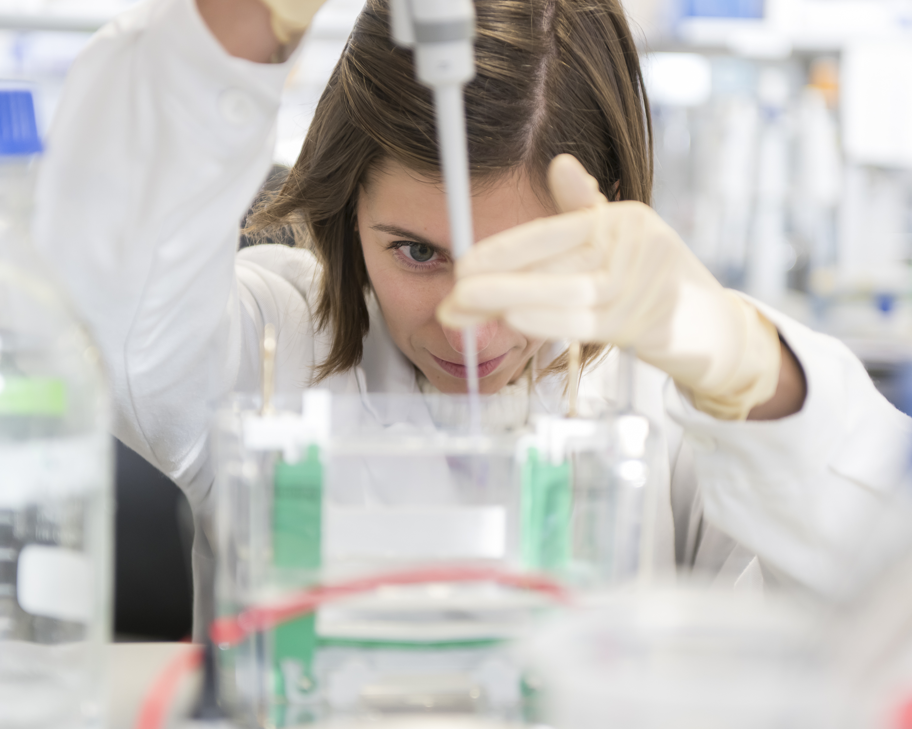 A female researcher working in Cell biology research laboratories