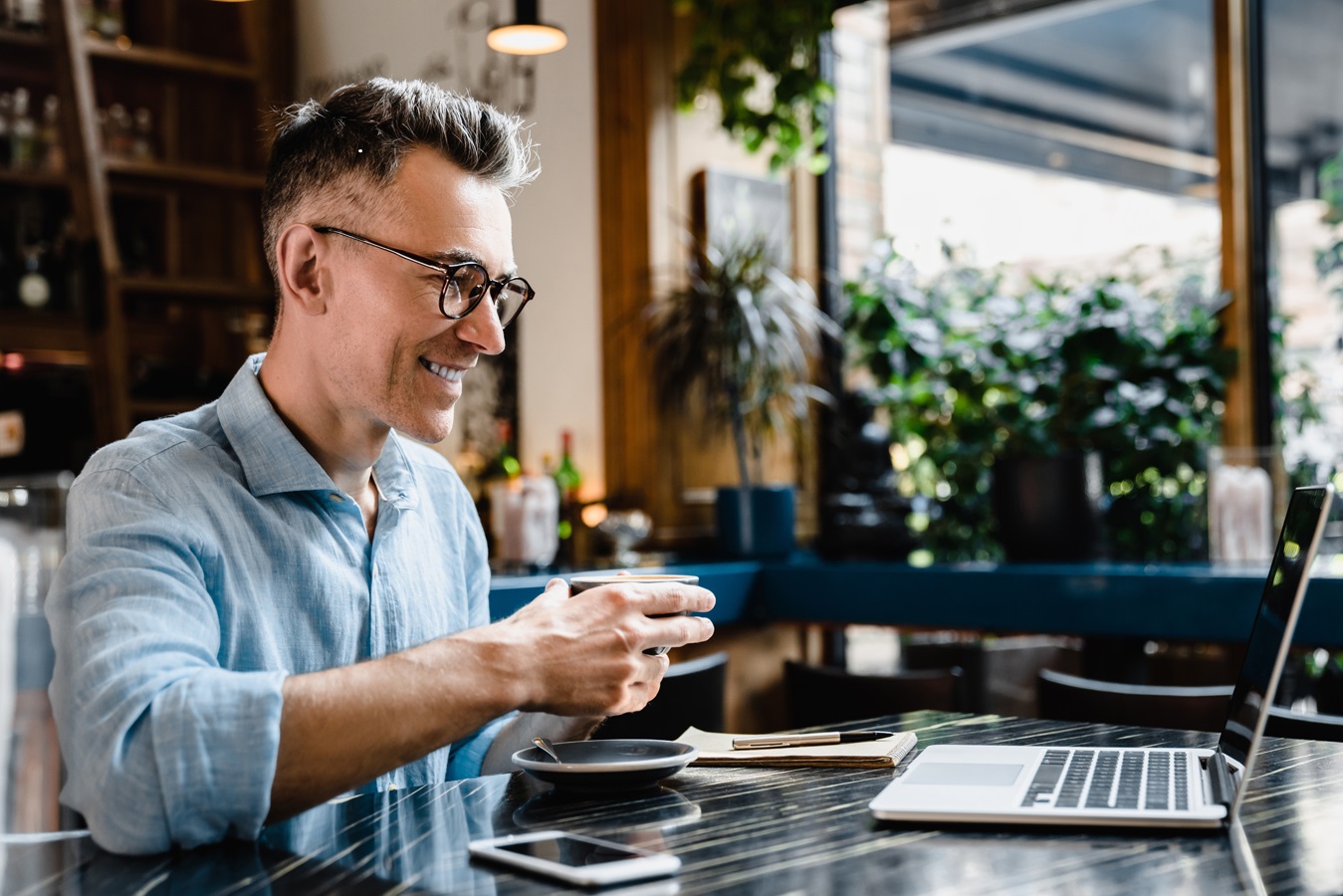 employee on laptop image