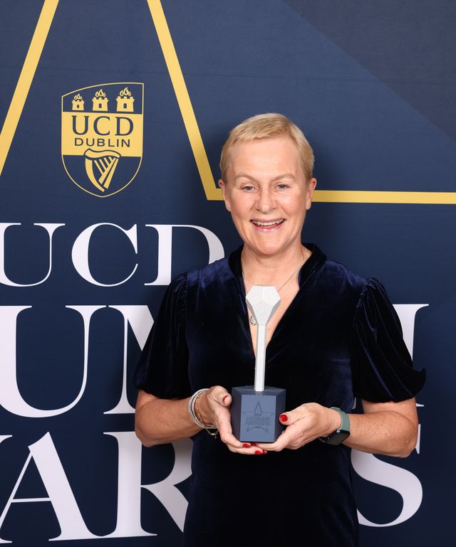 Alumni Awards winner 2023 Dr Margaret Faul with an award