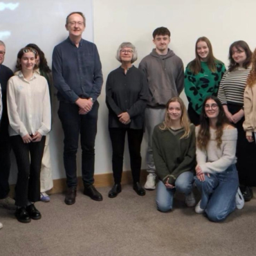 Speaker and students group photo