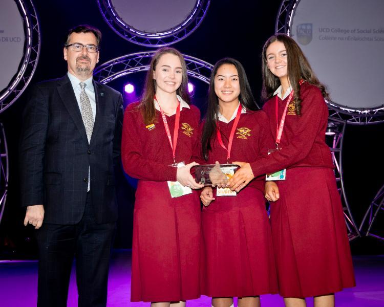 Professor Colin Scott, Dean of Social Sciences University College Dublin, Principal of UCD College of Social Sciences and Law presents the UCD Social Sciences  Award to Susie Gill, Sarah Kelly & Adrianne Ward, Loreto College, St. Stephen’s Green, Dublin 2 for their project titled “Let Science Influence The Voting Age” in the Social and Behavioural Sciences Category. 