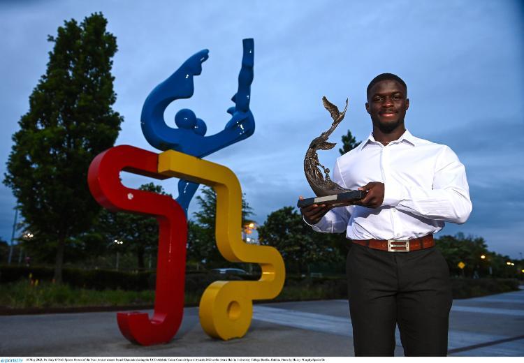 Israel Olatunde with his Dr. Tony O'Neill Sportsperson of the Year Award