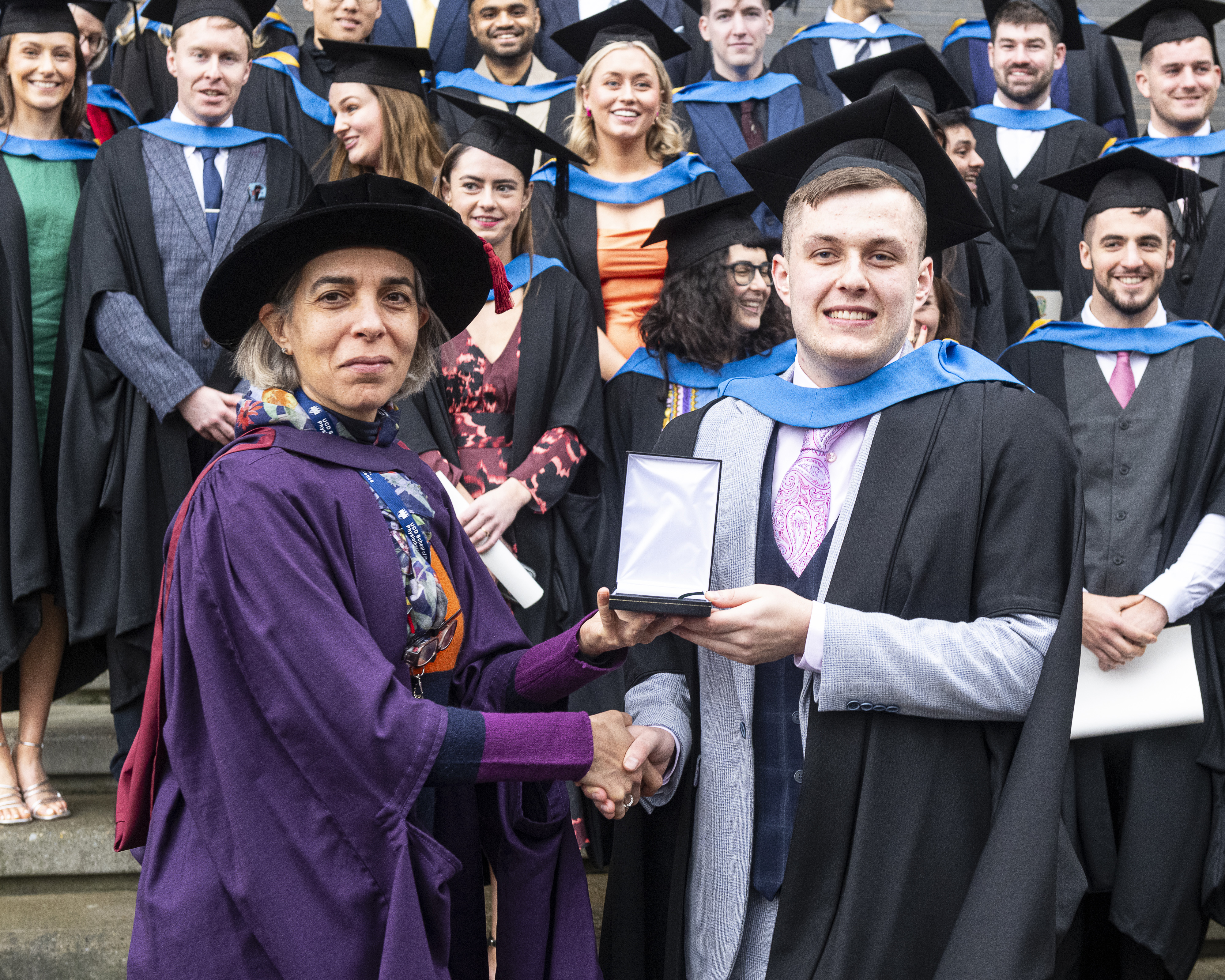 A student receiving an award