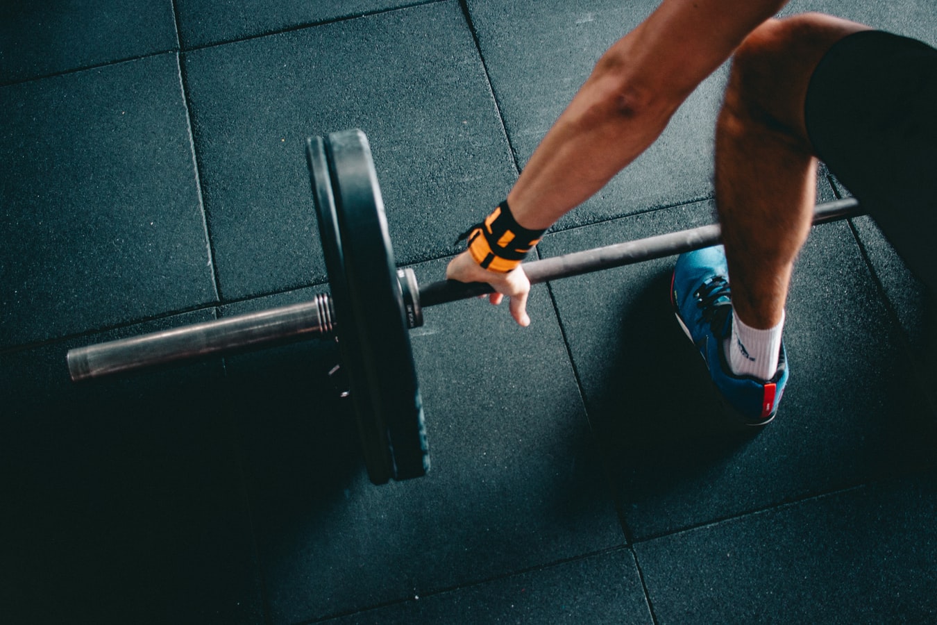 A barbell with weights being lifted