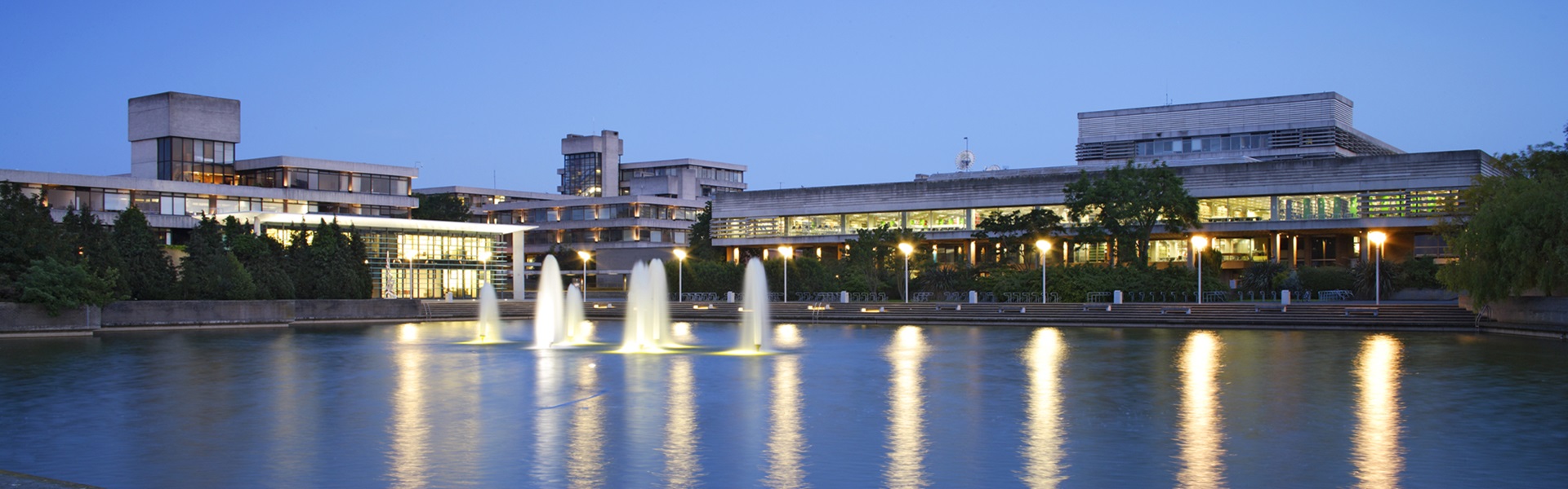 UCD Belfield campus buidlings and lake at night