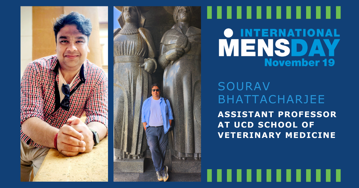 A promotional graphic for International Men’s Day. On the left, a portrait of a smiling man sitting with his hands resting on a table, wearing a red and white checked shirt and sunglasses hanging on his collar. In the center, the same man stands casually in front of a large stone sculpture featuring three tall human figures. On the right, text reads: “International Men’s Day, November 19” and “Ass