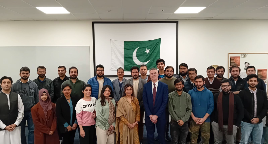 A group of students pictured with the Ambassador of Pakistan to Ireland, Aisha Farooqui, and Professor Rory Breathnach, both of whom stand in the front and centre of the group