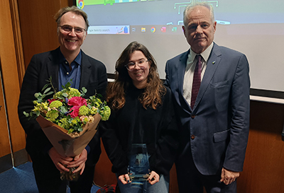 Steve Gordon (left) and Michael Doherty (right) presenting the Dean's Inclusion Award to Lorna Murphy (centre)