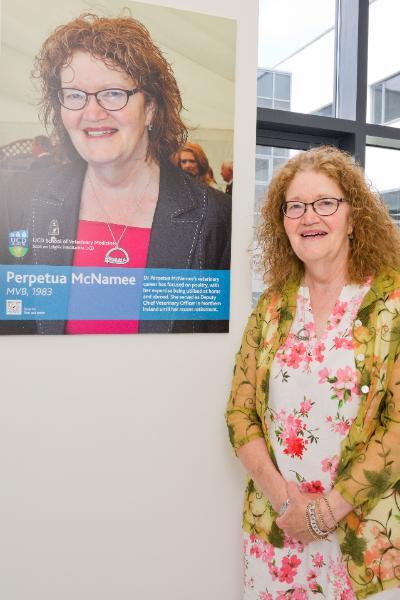 Perpetua McNamee with her Alumni Wall photo